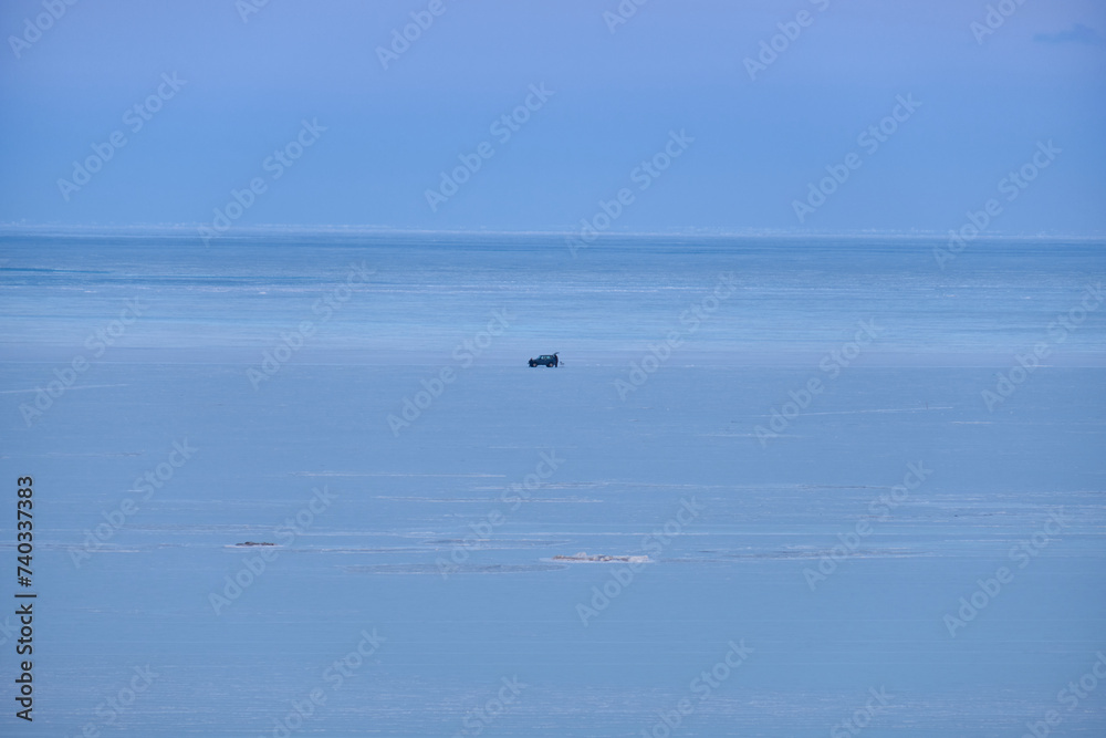 Obraz premium Vanino, Russia - Jan 18, 2021: Vanino Bay in the Tatar Strait in winter. The frozen sea.