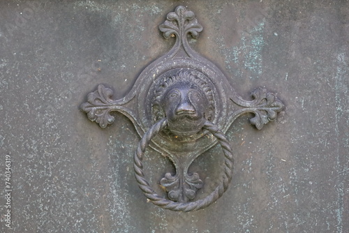 weatherd metal texture , wrought ornamented fence closep 