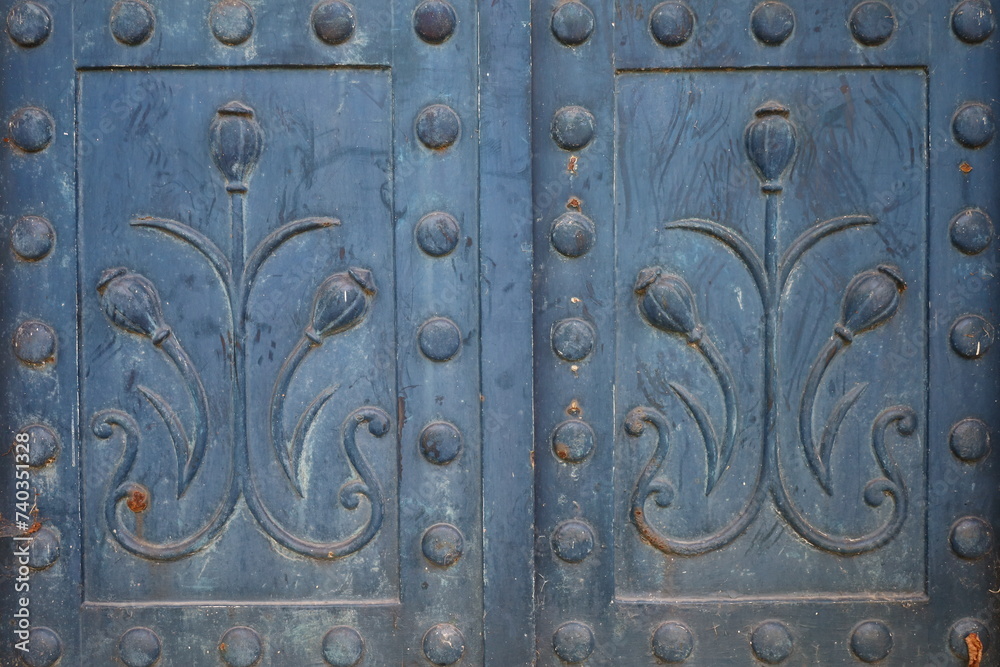 close up ancient weathered wrought metal ornaments close up ancient weathered wrought metal ornaments