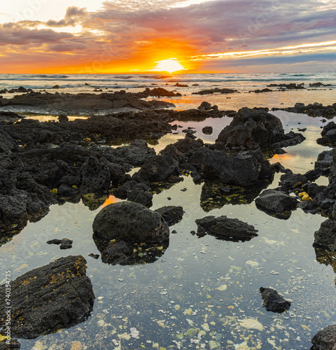 Cloud Reflection in Tide Pools on The Volcanic Shoreline of Giada's Beach, Hawaii Island, Hawaii, USA photo