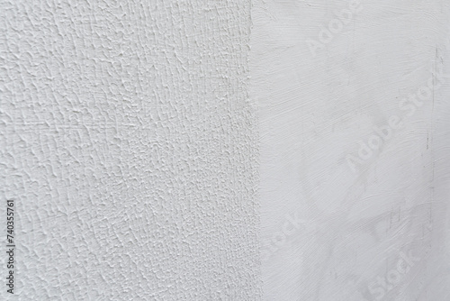 Brush vs. Roller: Applying Putty on Wall Reveals Different Techniques. photo
