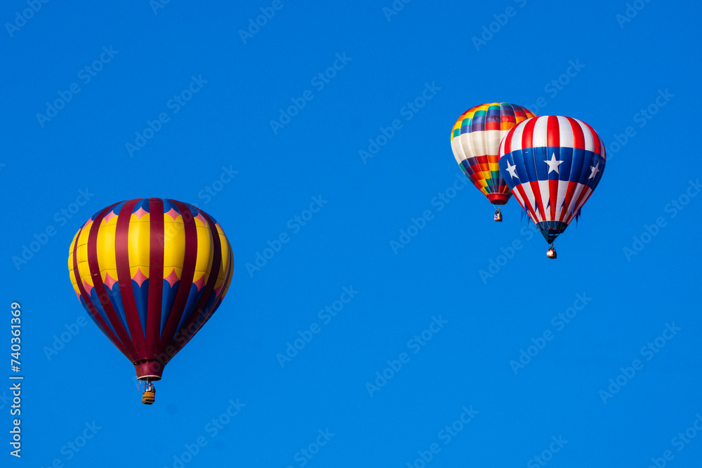 Fototapeta premium hot air balloons floating over southern Utah desert