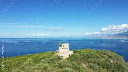 The tower of Isola di Cirella at the Tyrrhenian Sea in Europe, Italy, Calabria, in summer on a sunny day. photo