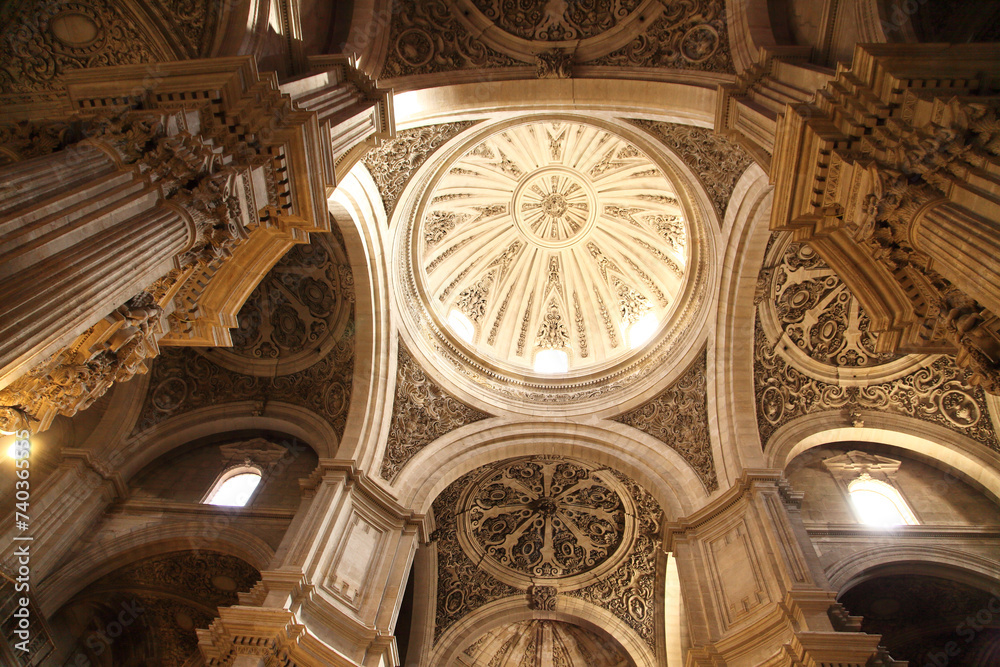 Inside Granada Cathedral, Spain. a decorative pattern on the ceiling