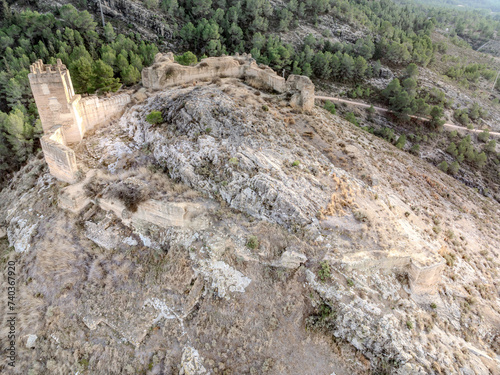 Aerial view of Pliego town and medieval castle in Southern Spain, ruined walls made of rammed earth with Arab origin photo