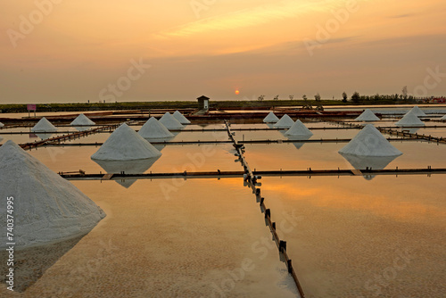 Sunset at Jingzaijiao Tile paved Salt Fields (offering a chance to see how salt is made), Tainan, Beimen District, Taiwan photo