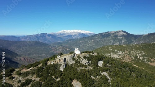 Kyriaki Monastery and Mount Parnassus in Europe, central Greece, towards Thisbe, in summer, on a sunny day. photo