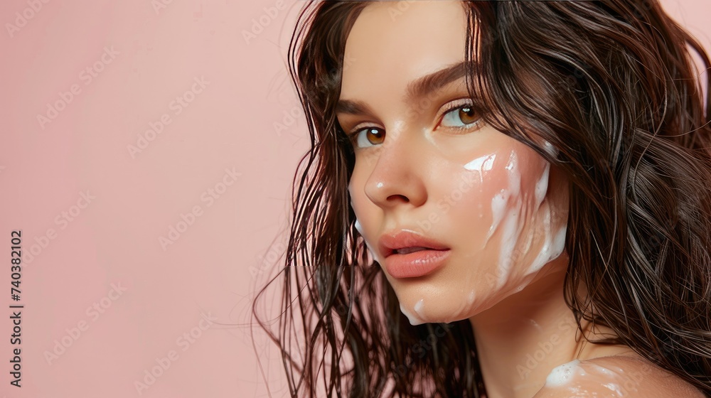 Photo portrait of young brunette with pouted lips wavy hair looking at side with gel foam on soft smooth skin Photo portrait of young brunette with pouted lips wavy hair looking at side with gel foam on soft smooth skin