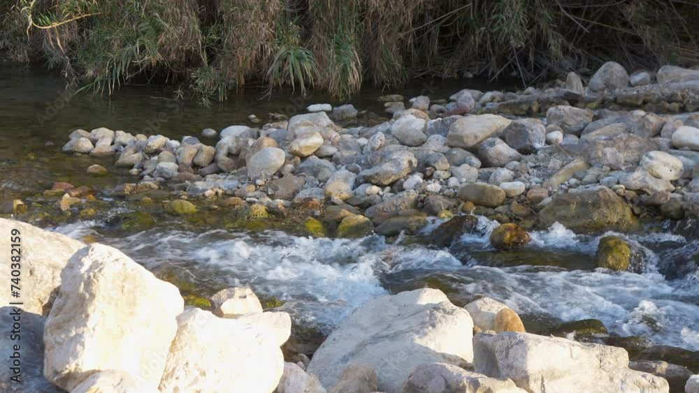 Rocky river scene with flowing water Rocky river scene with flowing water