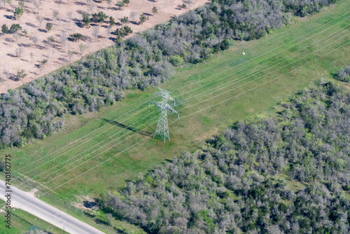 Aerial view of Electrical Power Lines and Transmission Towers in the Hill Country of Texas near Austin photo