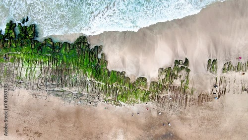 Laomei Green Reef, volcanic rocks with seasonal algae in Shimen District, New Taipei City, Taiwan photo