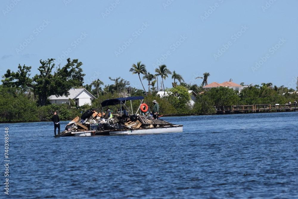 Salvage boating after hurricane ian