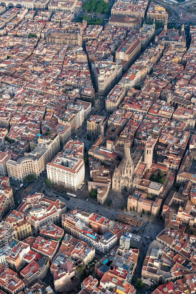Obraz premium Aerial high angle view of Barcelona old town buildings, Spain. Late afternoon light