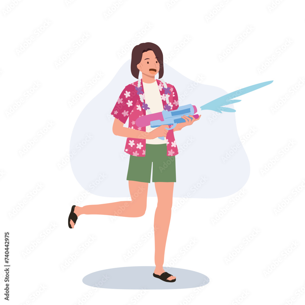 Joyful Asian Woman Enjoying Songkarn Festival Water Fight. woman with Water Gun Joyful Asian Woman Enjoying Songkarn Festival Water Fight. woman with Water Gun