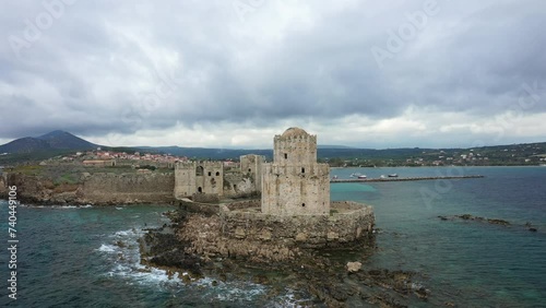 Methoni Castle tower in Modon in Europe, Greece, Peloponnese, Mani in summer on a sunny day. photo