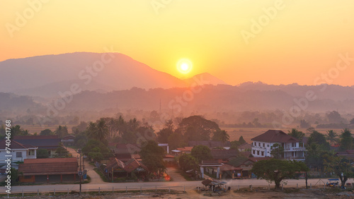 19022024 Colorful hot air balloons fly over the Vang vieng city  Laos in Asia. This was during sunrise on a clear hot day during dry season.