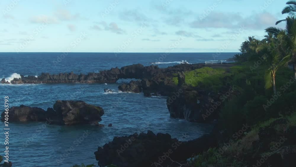 Slow pan right shot of Waianapanapa State Park, coastal scene, Hawaii Slow pan right shot of Waianapanapa State Park, coastal scene, Hawaii