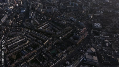 pan up aerial shot from the Angel Islington towards the city of London photo