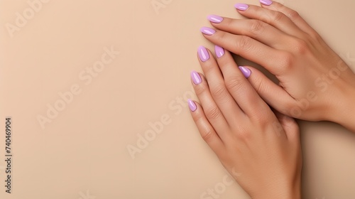 Top view of a hand with purple nail polish in a peach backdrop with a big empty space for text or product, Generative AI.