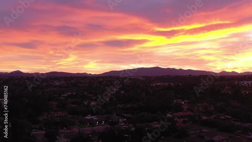 Vibrant sunrise over Chula Vista California, suburb of San Diego. Drone flight.