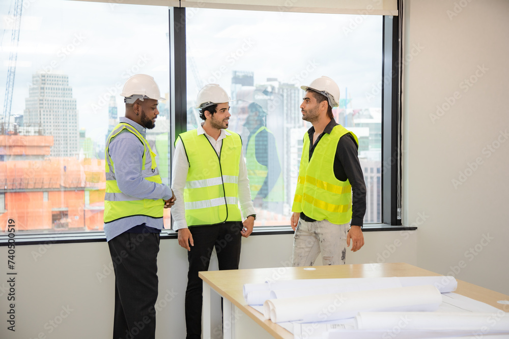 professional engineer and construction foreman team person with safety hard hat helmet discussion to working in business industry of architect job teamwork, a work at building construction site
