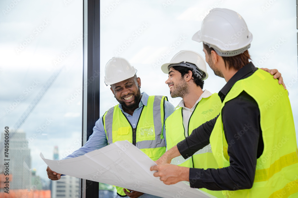 professional engineer and construction foreman team person with safety hard hat helmet discussion to working in business industry of architect job teamwork, a work at building construction site
