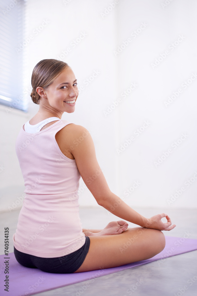 Fototapeta premium Relax, meditation and woman in lotus pose on yoga mat with zen, balance and spiritual peace. Tranquility, mindfulness and girl on floor with quiet focus, breathing exercise and calm chakra energy.