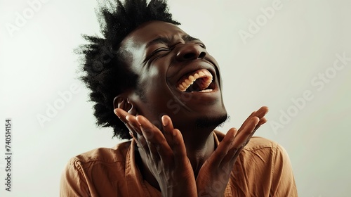 Positive and joyful Afro American male with fine crop of hair bursting into laughing holding his hands on stomach cant stopping laughing after hearing funny anecdote Positive emotions  : Generative AI