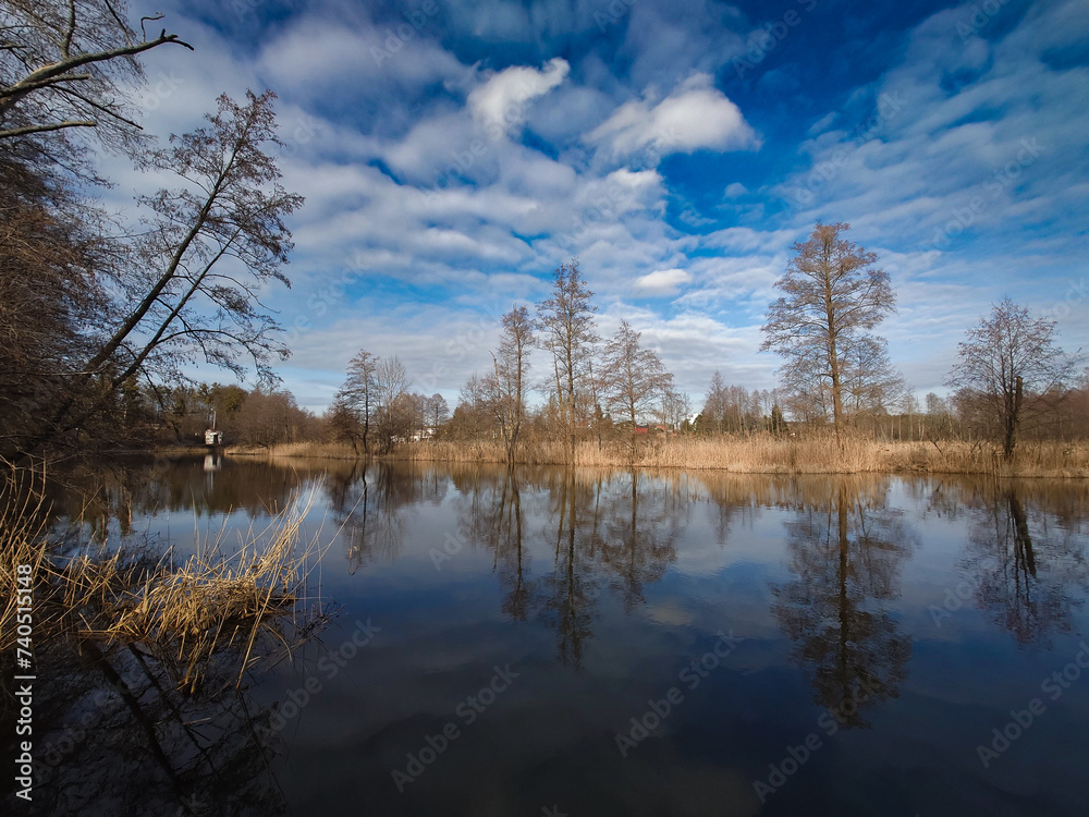 Wadag River. Reflection of trees in the water
