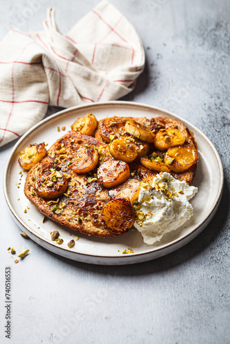 French toast with caramelized banana and pistachios.