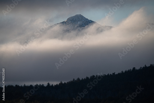 Ice Covered Mount Chocorua Through The Clouds