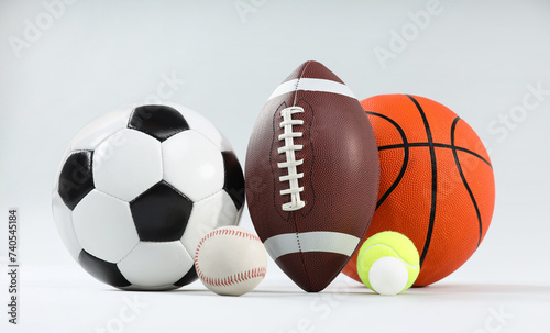 Many different sports balls on light gray background © New Africa