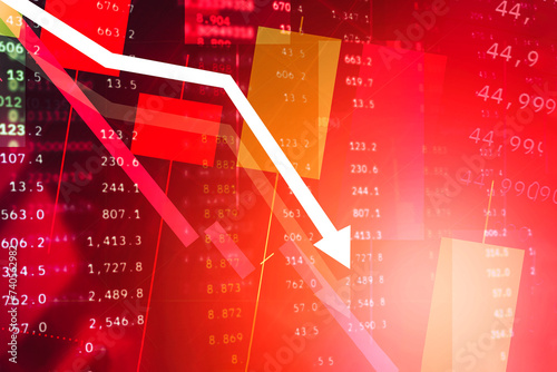 Stock market crash with arrow going down and red graph decreasing. Capital at risk. Bitcoin on arrow goes down and line charts with extreme price drop cryptocurrencies market Spot, futures and funding photo