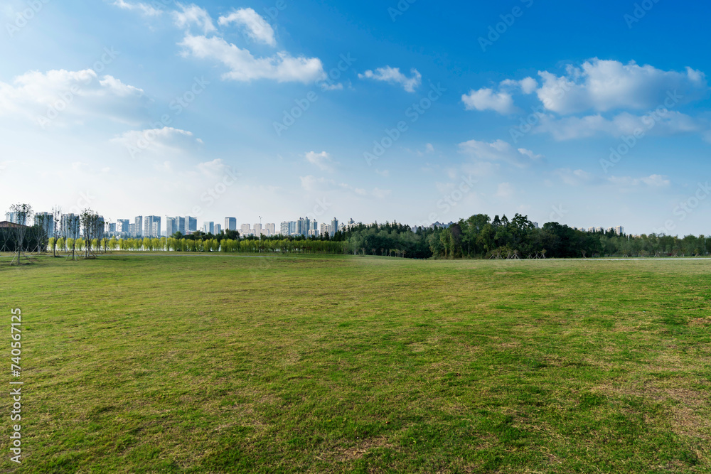 Obraz premium spring park and modern city