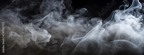 Mesmerizing dance of white smoke against a deep black background