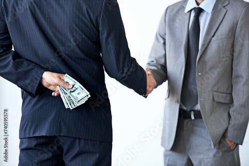 Handshake, deal with corruption and business people in meeting, illegal partnership and fraud with money laundering. Agreement, collaboration and payment for crime with bribery on white background