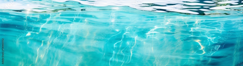 Obraz premium Underwater panorama of swimming pool water with sun reflections, panoramic banner background