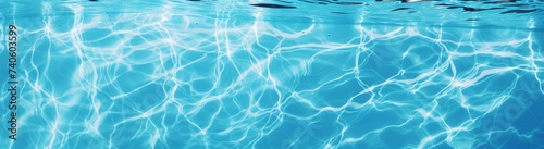 Underwater panorama of swimming pool water with sun reflections, panoramic banner background