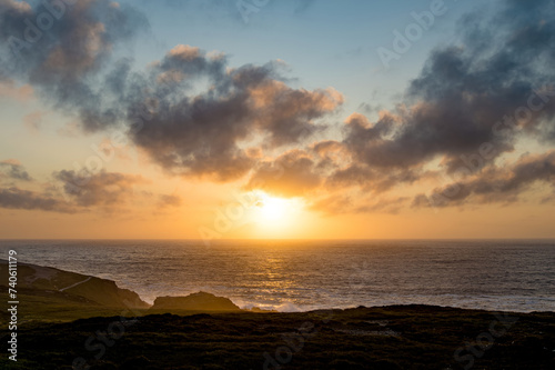 Sun setting at Malin Head, Ireland's northernmost point, Wild Atlantic Way, spectacular coastal route. Numerous Discovery Points. Co. Donegal