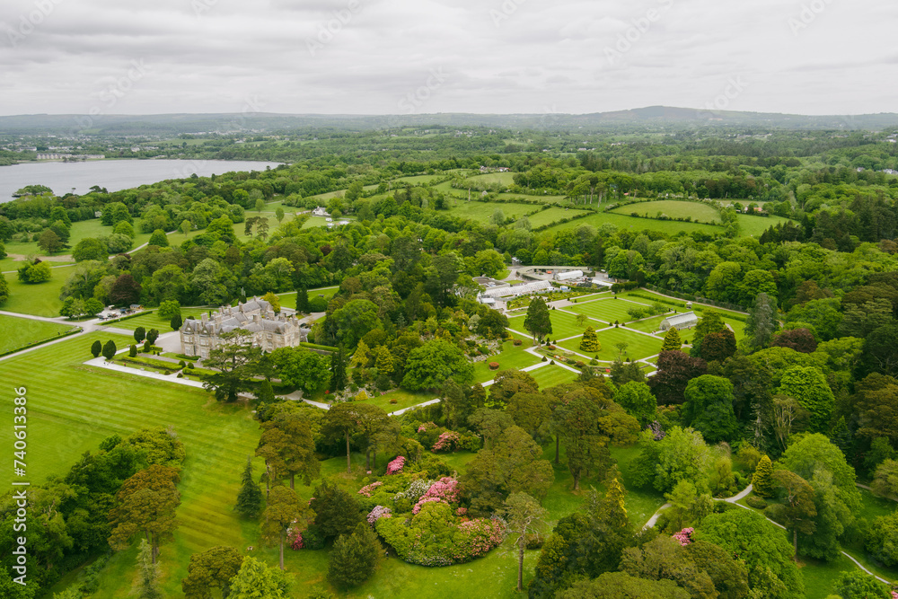 Aerial view of Muckross House, furnished 19th-century mansion set among mountains and woodland in Killarney National Park, county Kerry, Ireland.