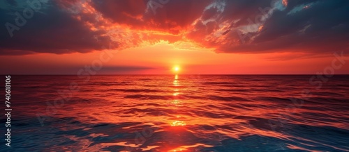Glorious sunset over the tranquil ocean waves bringing peace and serenity