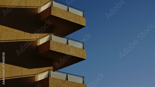 balconies on building facade against the sky