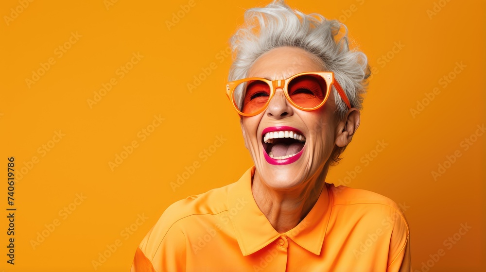 Radiant Elderly Woman in Yellow with Orange Glasses Radiant Elderly Woman in Yellow with Orange Glasses