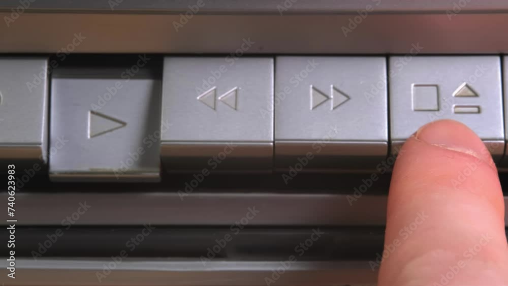 old tape recorder, pressing the play button on an old tape recorder ...