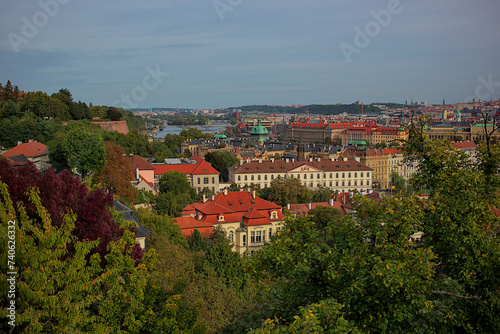 Panoramic view of the city of Prague from the observation deck. Streets and architecture of the old city. Romantic town panorama  historical buildings  red roofs  churches.