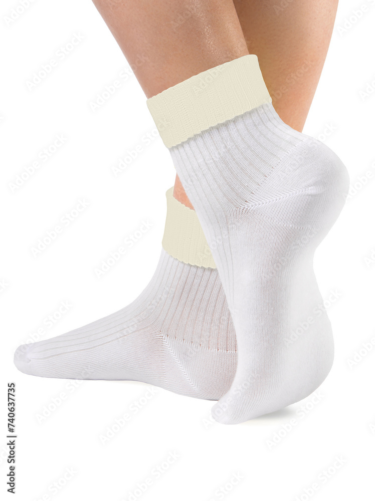 Side view of beautiful woman foot dressed in new nice and soft natural cotton fabric blank white socks Side view of beautiful woman foot dressed in new nice and soft natural cotton fabric blank white socks