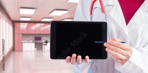 Doctor with tablet computer...