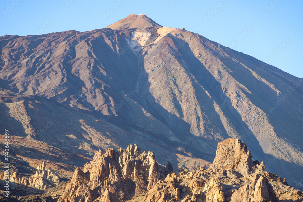 Pico del Teide volcano with beautiful rock formations. Sunset golden hour landscape