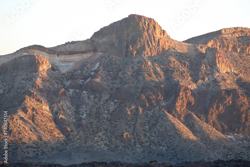 Fototapeta Naklejka Na Ścianę i Meble -  Scenery in El Teide National Park on Tenerife. Volcanic orange landscape during sunset. Volcano crater