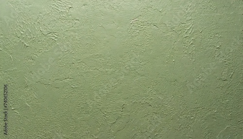 Texture of pastel green putty wall.